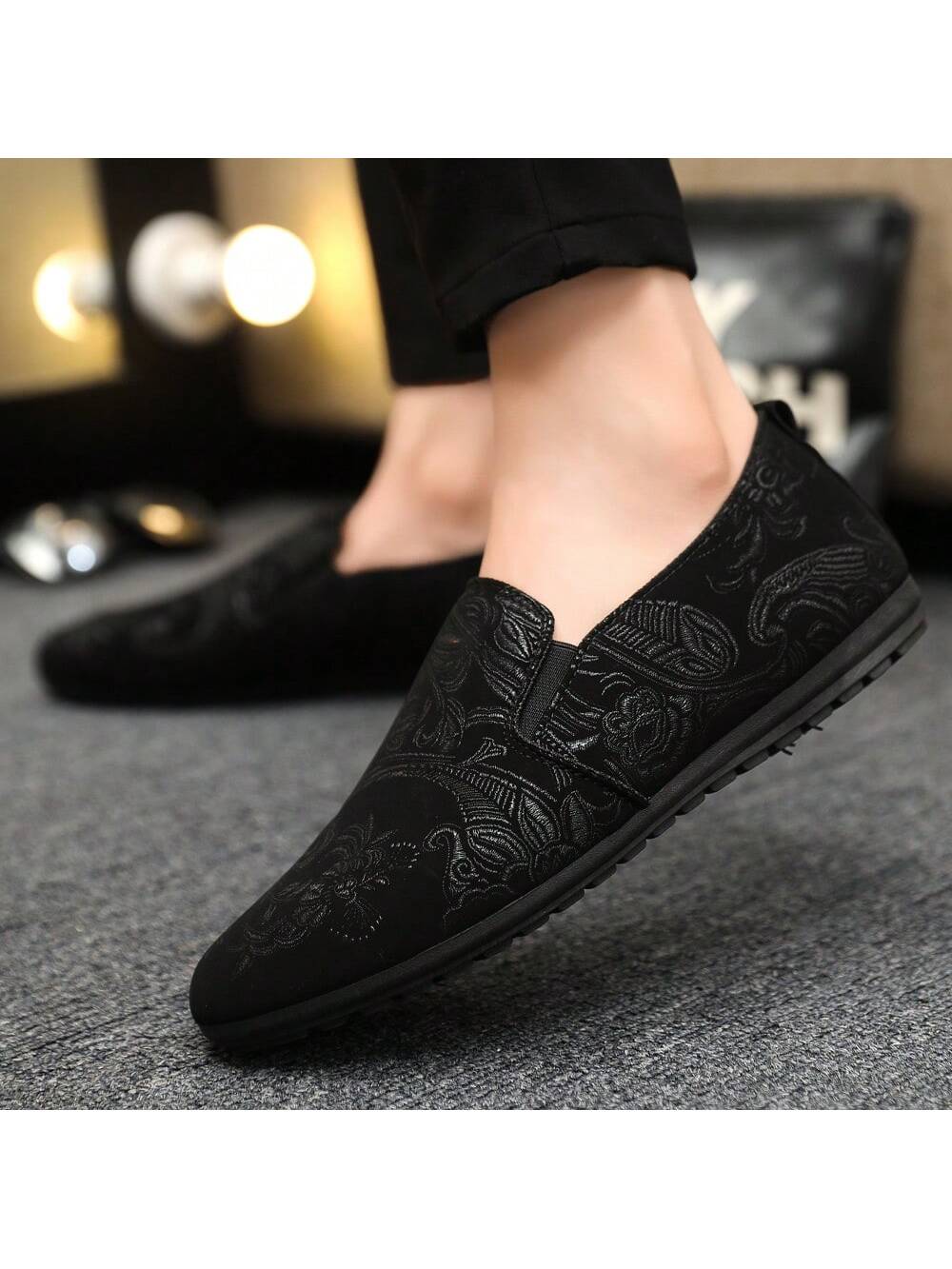 Fashionable summer men's loafers with anti-slip sole and printed PU leather upper in black.